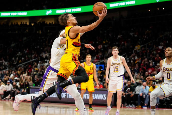 Atlanta Hawks guard Trae Young (11) goes to the basket against the Los Angeles Lakers during the second half at State Farm Arena.